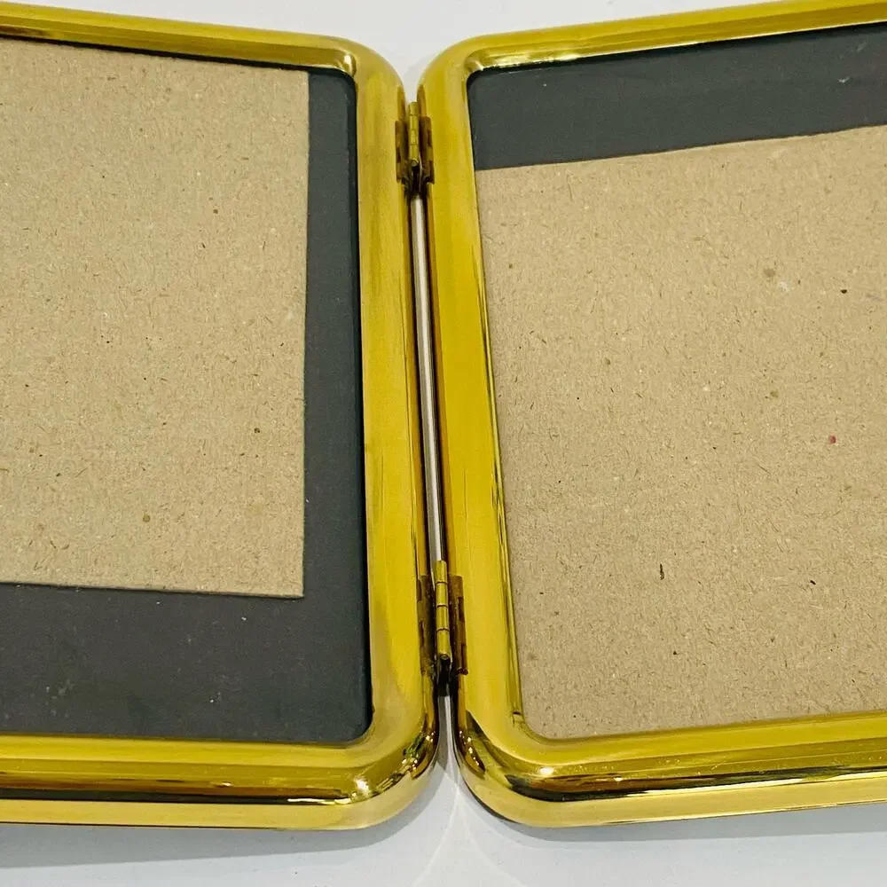 Vintage 1980's double brass photo frame free standing book style holds two 5 x 7